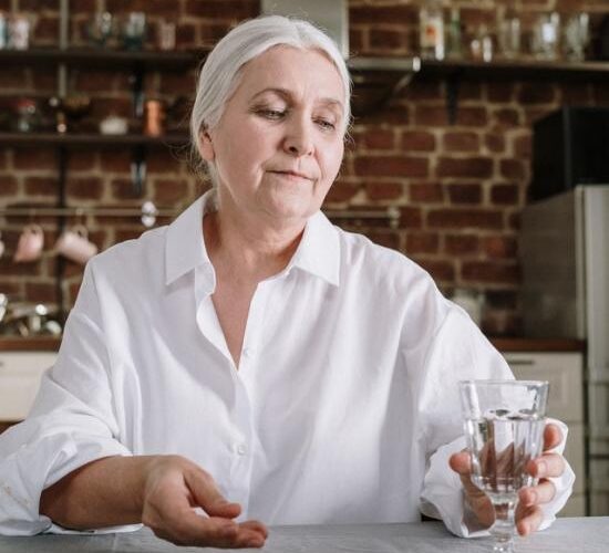 an-elderly-woman-taking-her-medicines-4057762