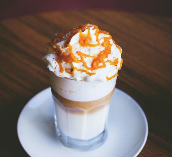 white-and-brown-caramel-frappe-on-clear-drinking-glass-214333