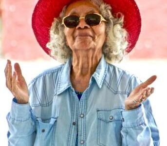 fabulous older woman in red hat